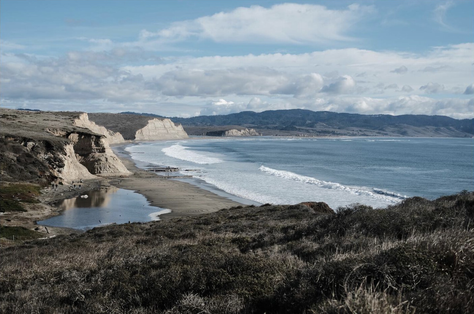 Waves breaking along a rugged Point Reyes shoreline